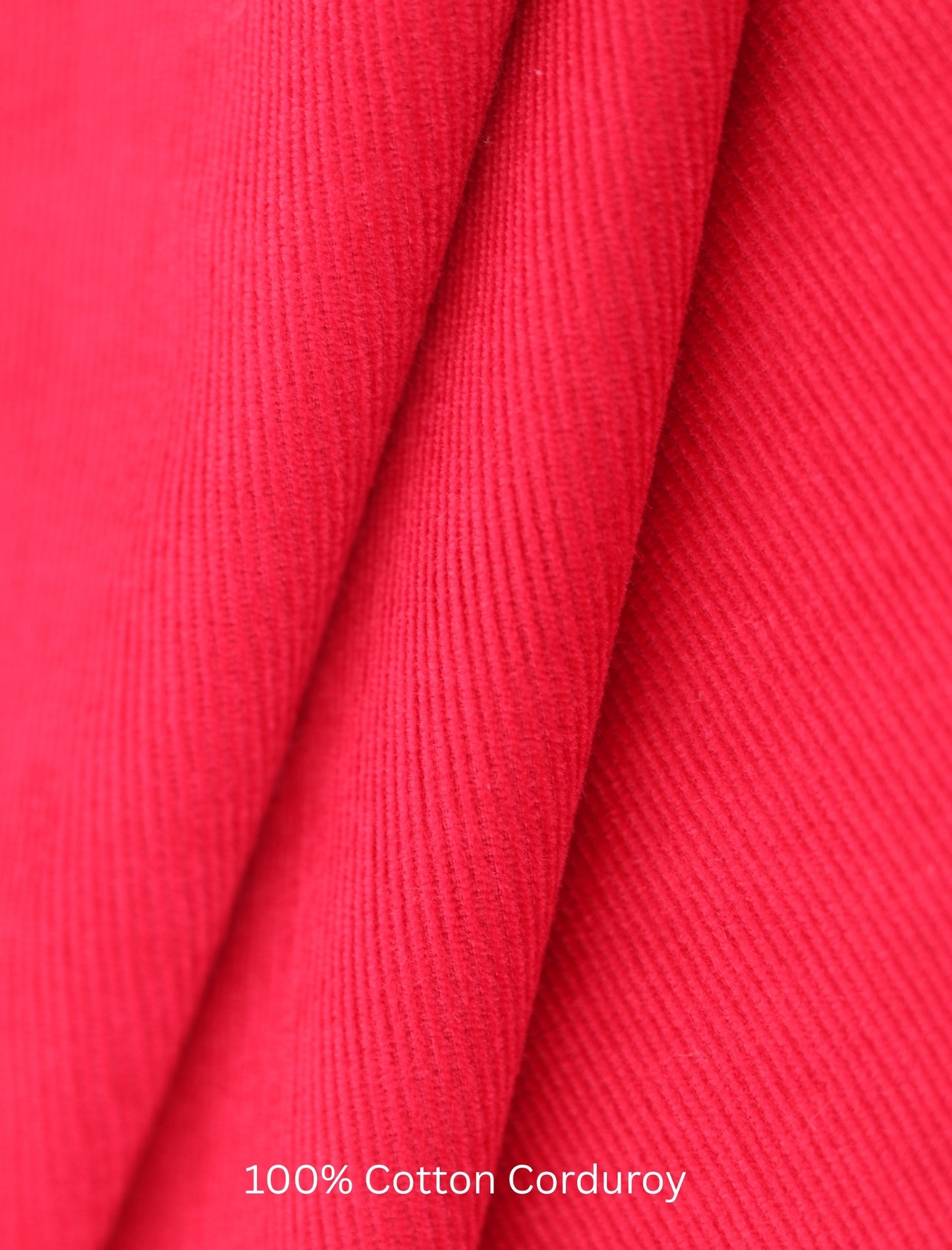 Close-up of red cotton corduroy fabric with '100% Cotton Corduroy' text.