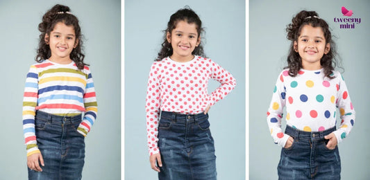 Young girl modeling long sleeve tops with stripes, red polka dots, and multi-color dots, paired with denim skirt