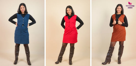 Girl modeling corduroy dungaree dresses in blue, red, and brown with boots for kids fashion