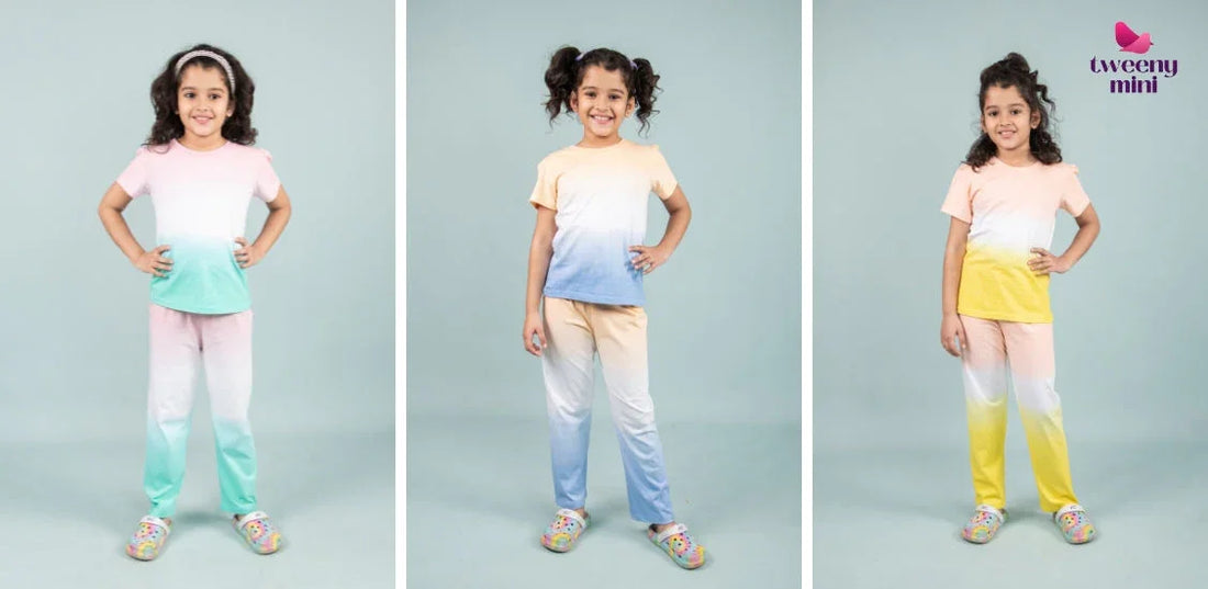 Girls modeling colorful tie-dye night suits with matching tops and pants for kids