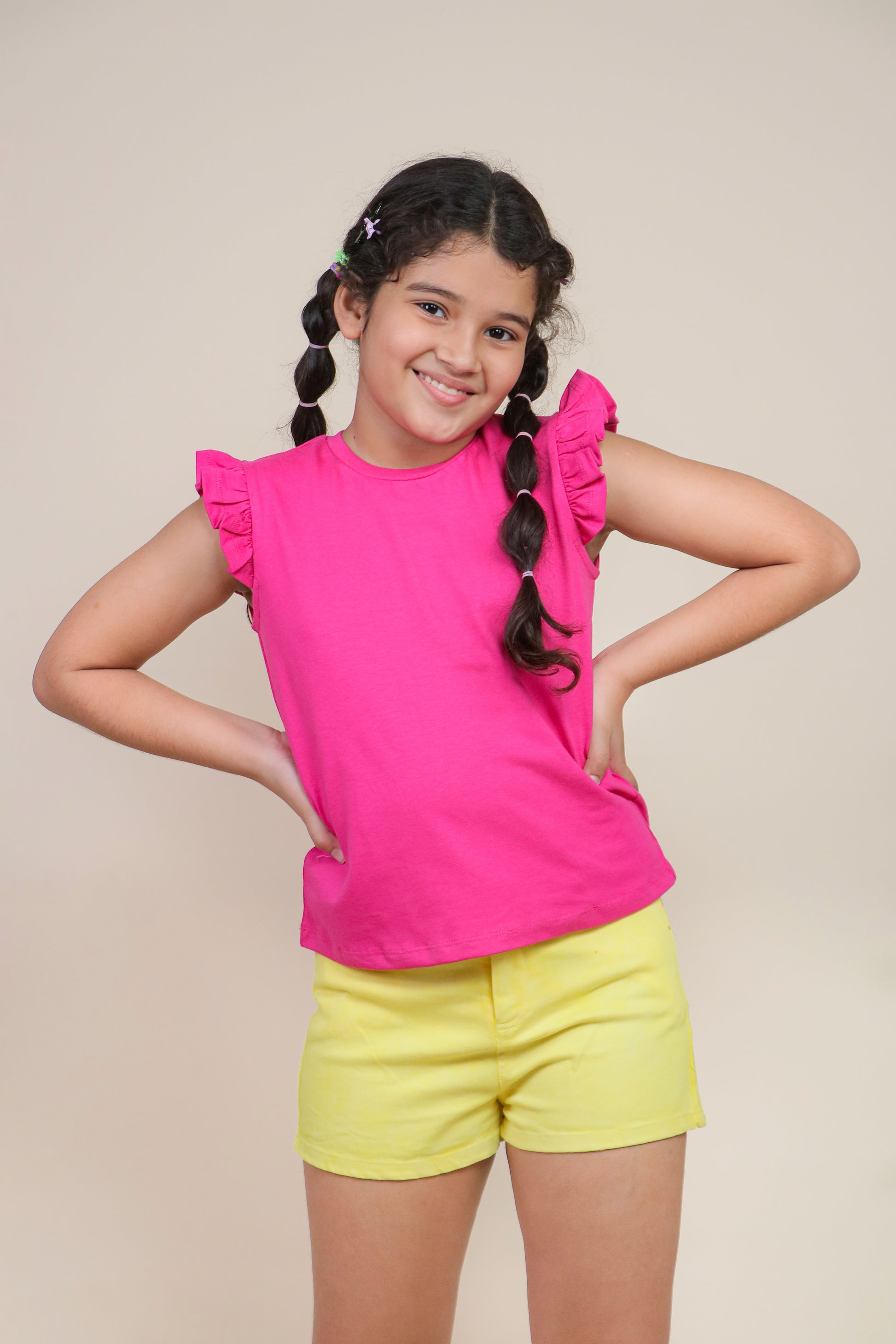 Elasticated waistband on girls' cotton active shorts, comfortable fit for active play
