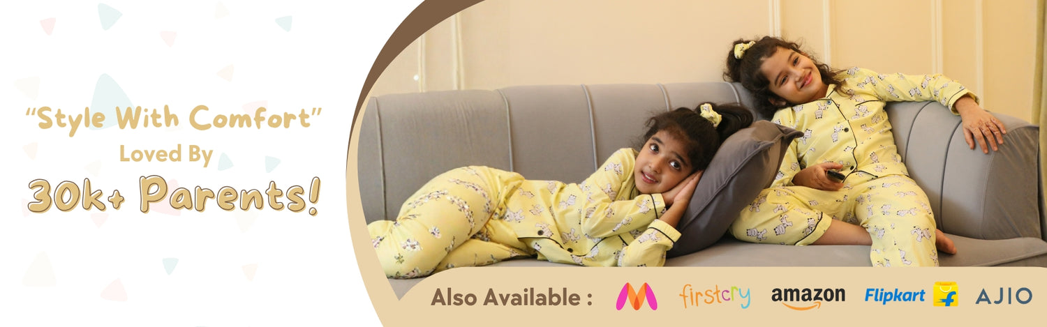 Two children in matching pajamas sitting on a couch with promotional text about.