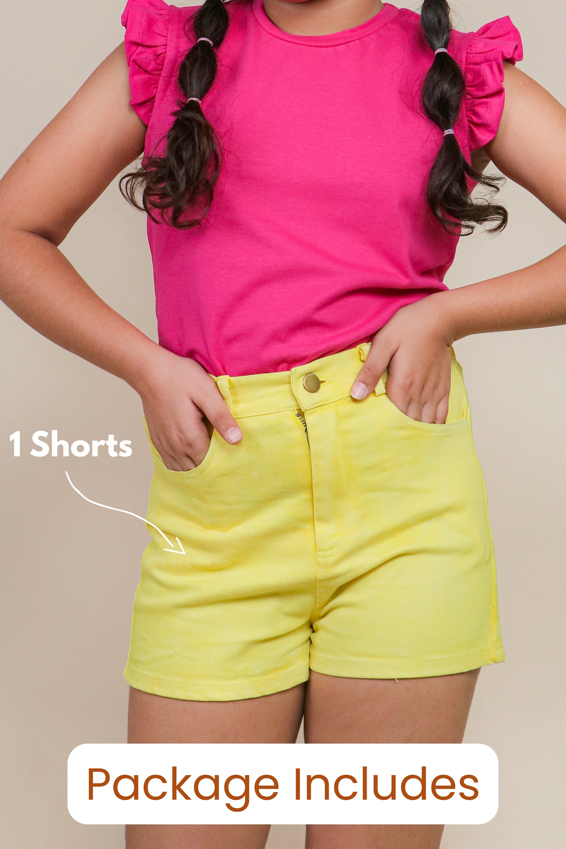 Girl wearing sunshine yellow cotton shorts outdoors, Tweeny Mini active wear for kids