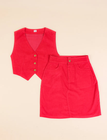 Red vest and skirt set on a beige background