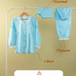 Set of light blue clothing items including a camisol, shirt, and pyjama on a rack with text indicating package contents and washing instructions.