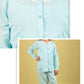 Light blue pajama set with lace trim on a white background