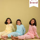 Girls in pastel-colored outfits sitting on a yellow background with 'Only Girls Brand' text.
