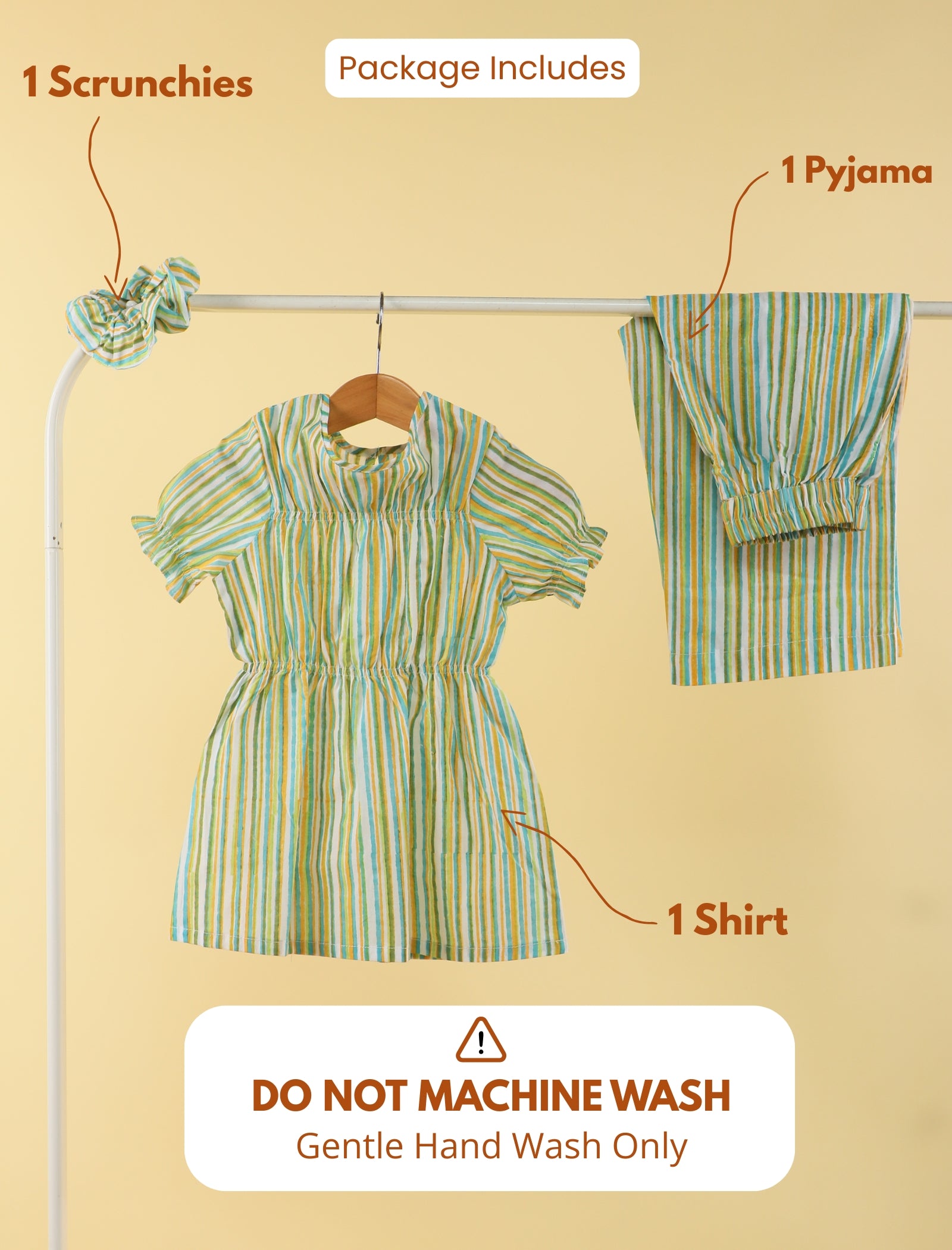 Set of clothes including a dress, shirt, and pyjama on a rack with text indicating package contents and washing instructions.
