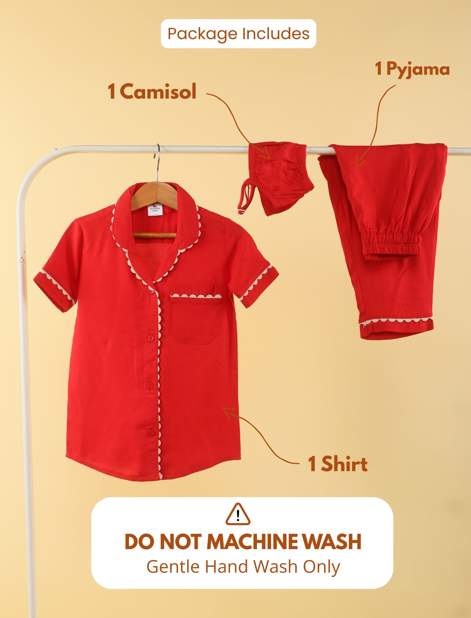 Red clothing set with shirt, camisole, and pyjama on a hanger against a beige background.
