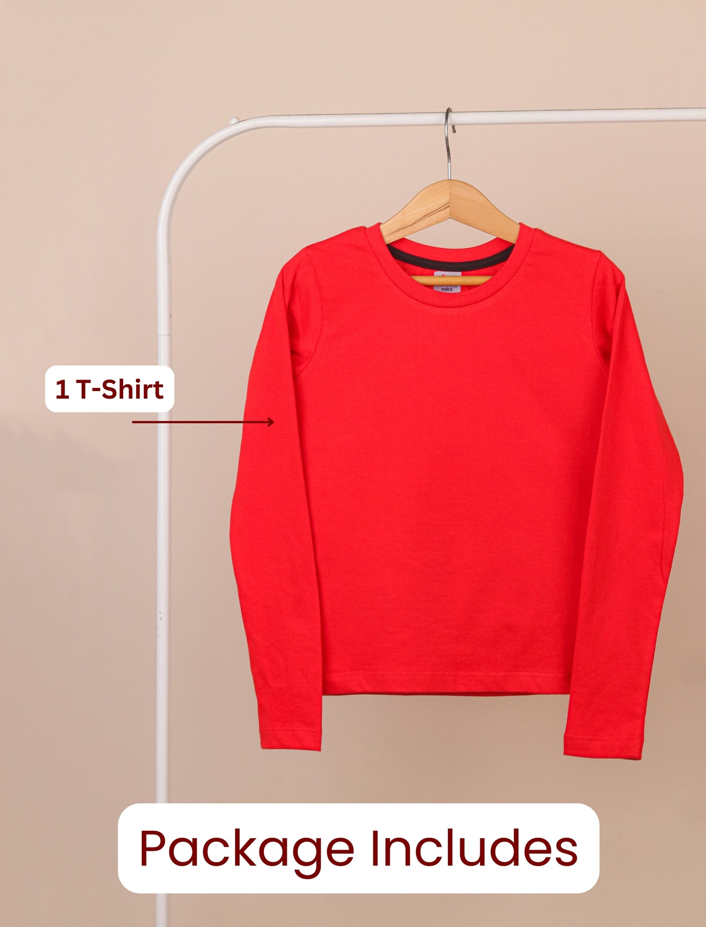 Red long-sleeve shirt on a hanger against a beige background