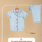 Set of striped shirt and pyjama on a hanger with washing instructions on a beige background