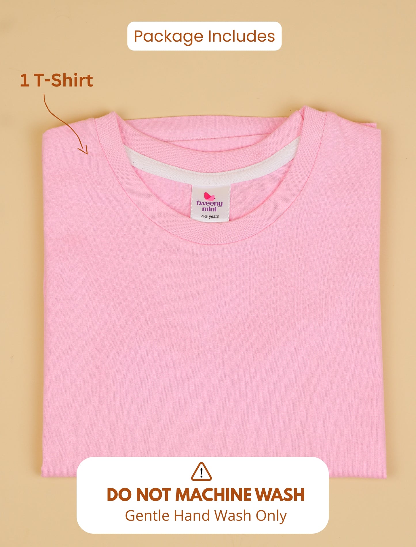 Folded pink t-shirt with a label on a beige background