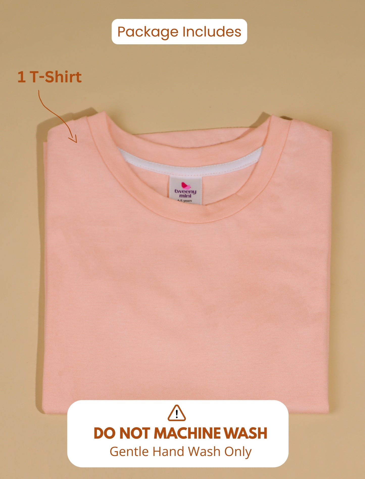 Peach t-shirt with a label on a beige background