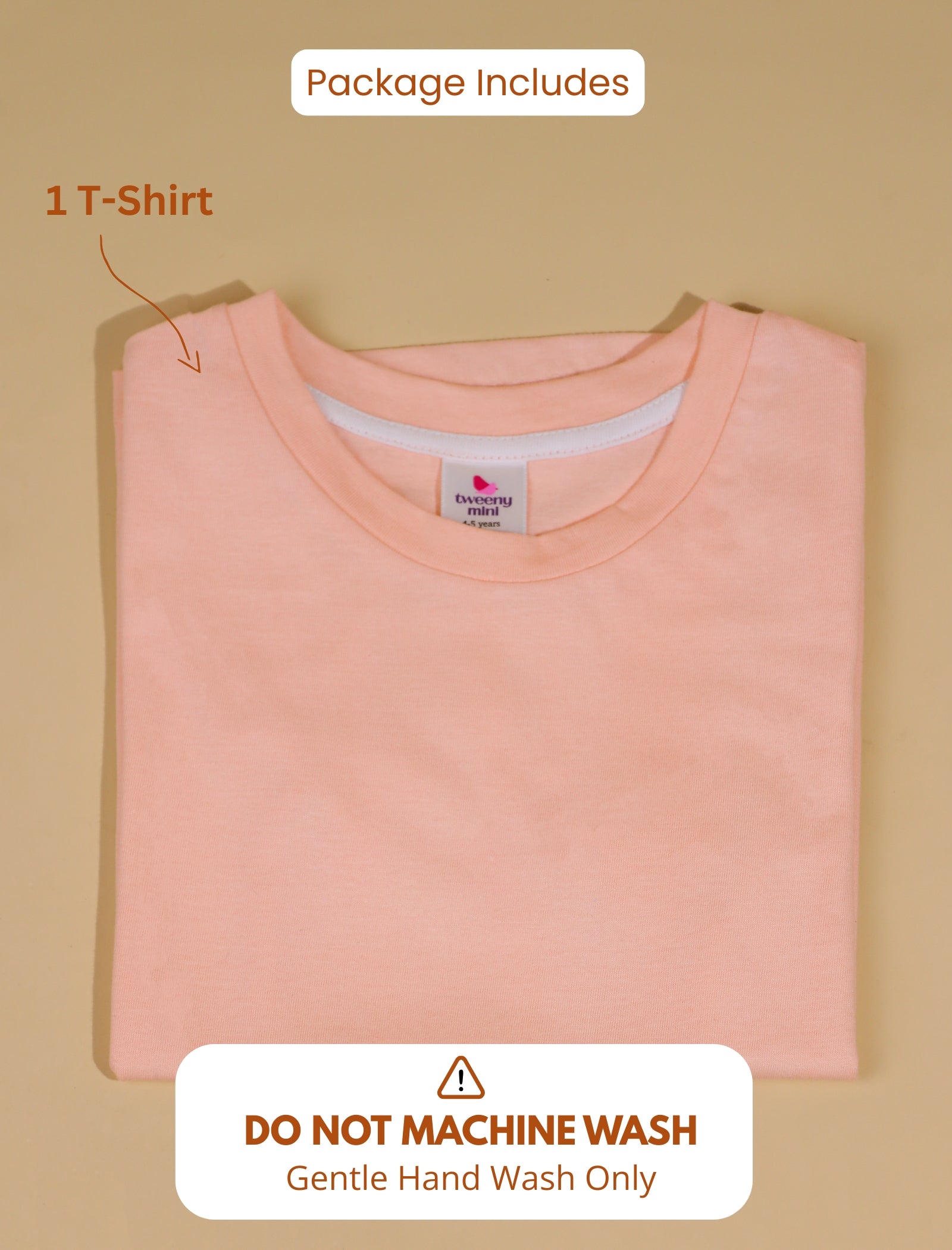 Peach t-shirt with a label on a beige background