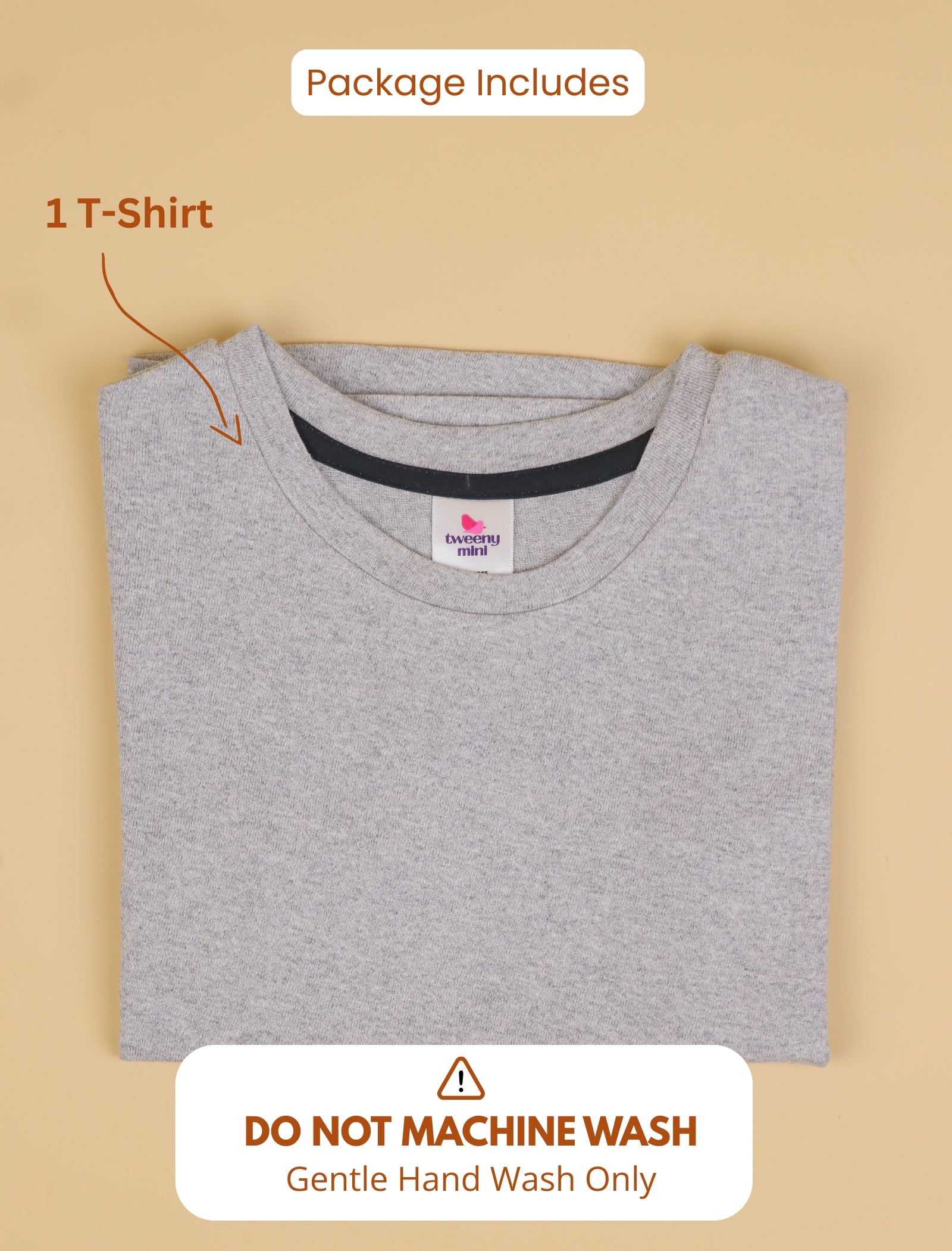 Folded gray t-shirt with a brand label on a beige background, including text about washing instructions.