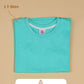 Turquoise t-shirt on a beige background with text indicating 'Do Not Machine Wash'.