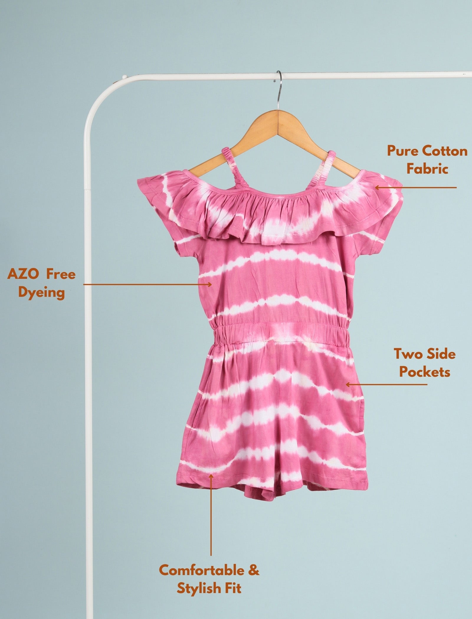 Pink and white tie-dye dress on a hanger with text highlighting features.