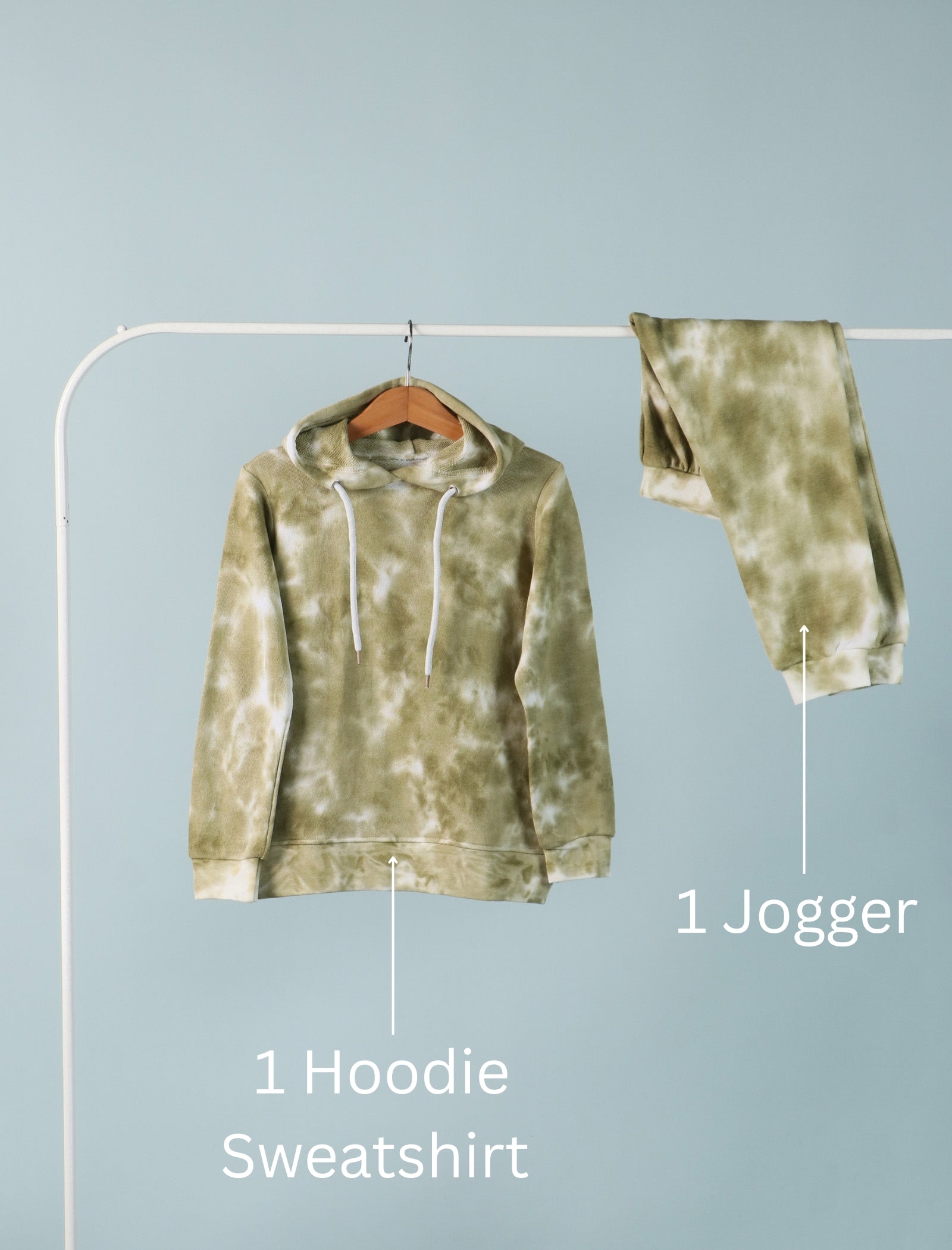 Green tie-dye hoodie sweatshirt and jogger set on a rack against a light blue background.