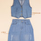 Denim waistcoat and skirt set on a beige background with labels indicating the items included.