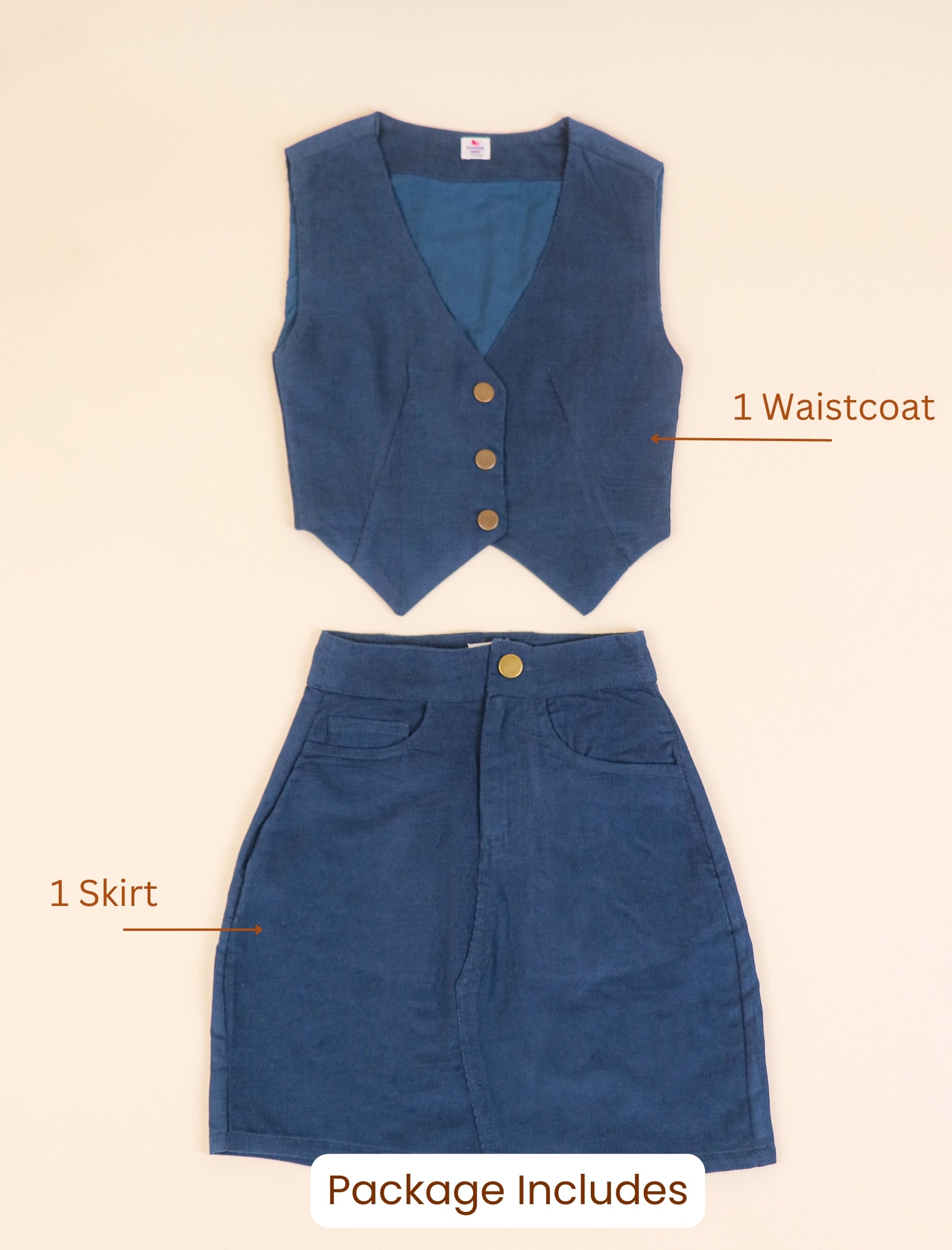 Blue waistcoat and skirt set on a beige background with text indicating contents.