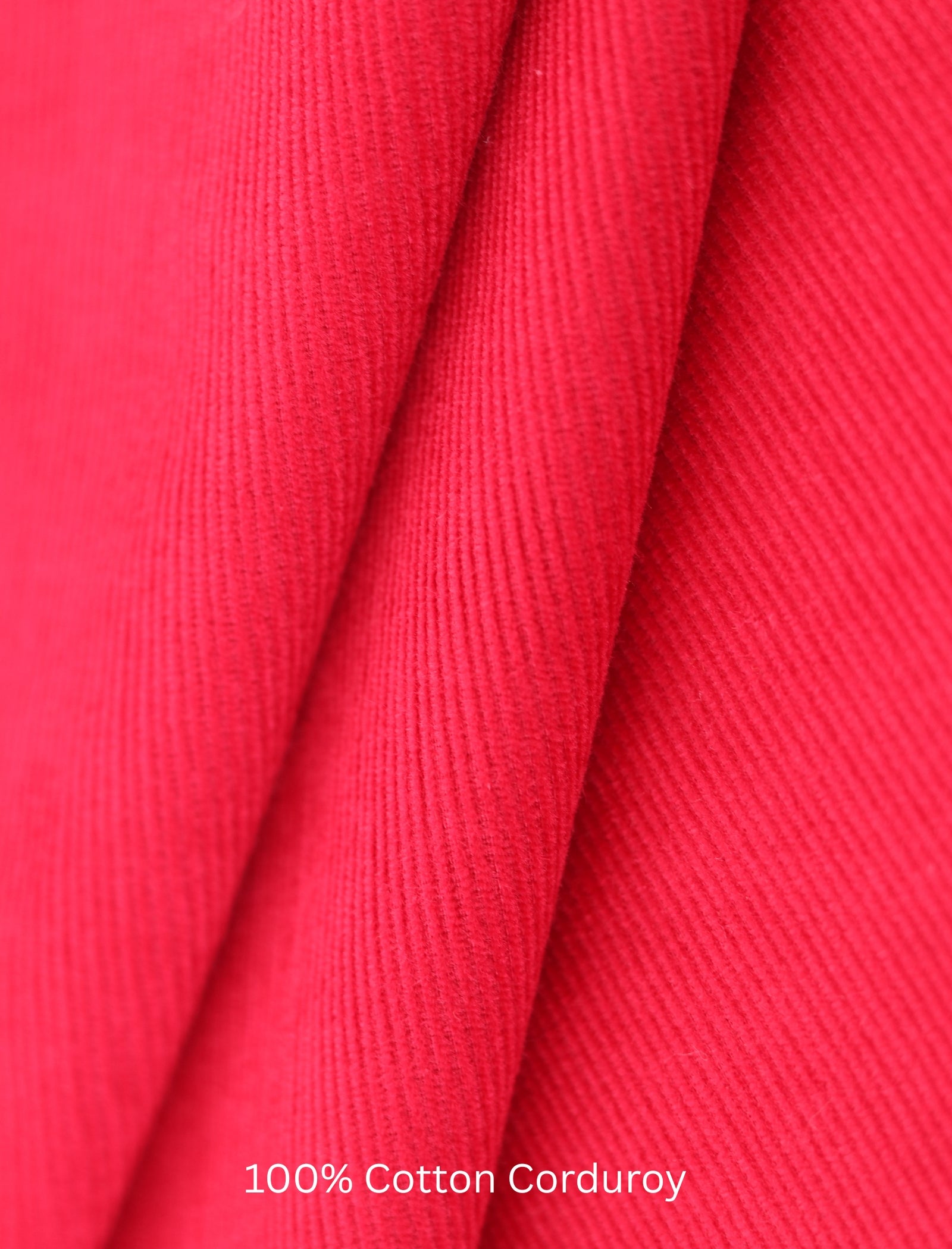 Close-up of red cotton corduroy fabric with '100% Cotton Corduroy' text.