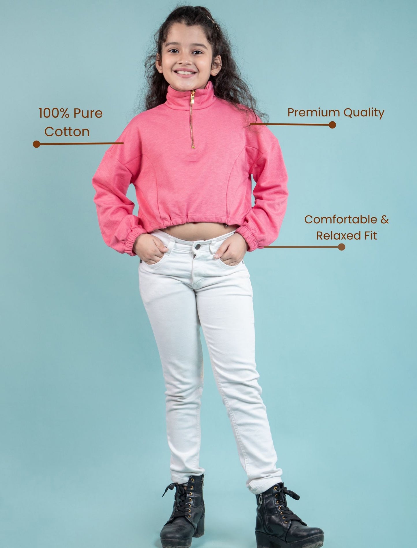 Zippered sweatshirt for kids wearing a pink jacket and white pants with text on a light blue background