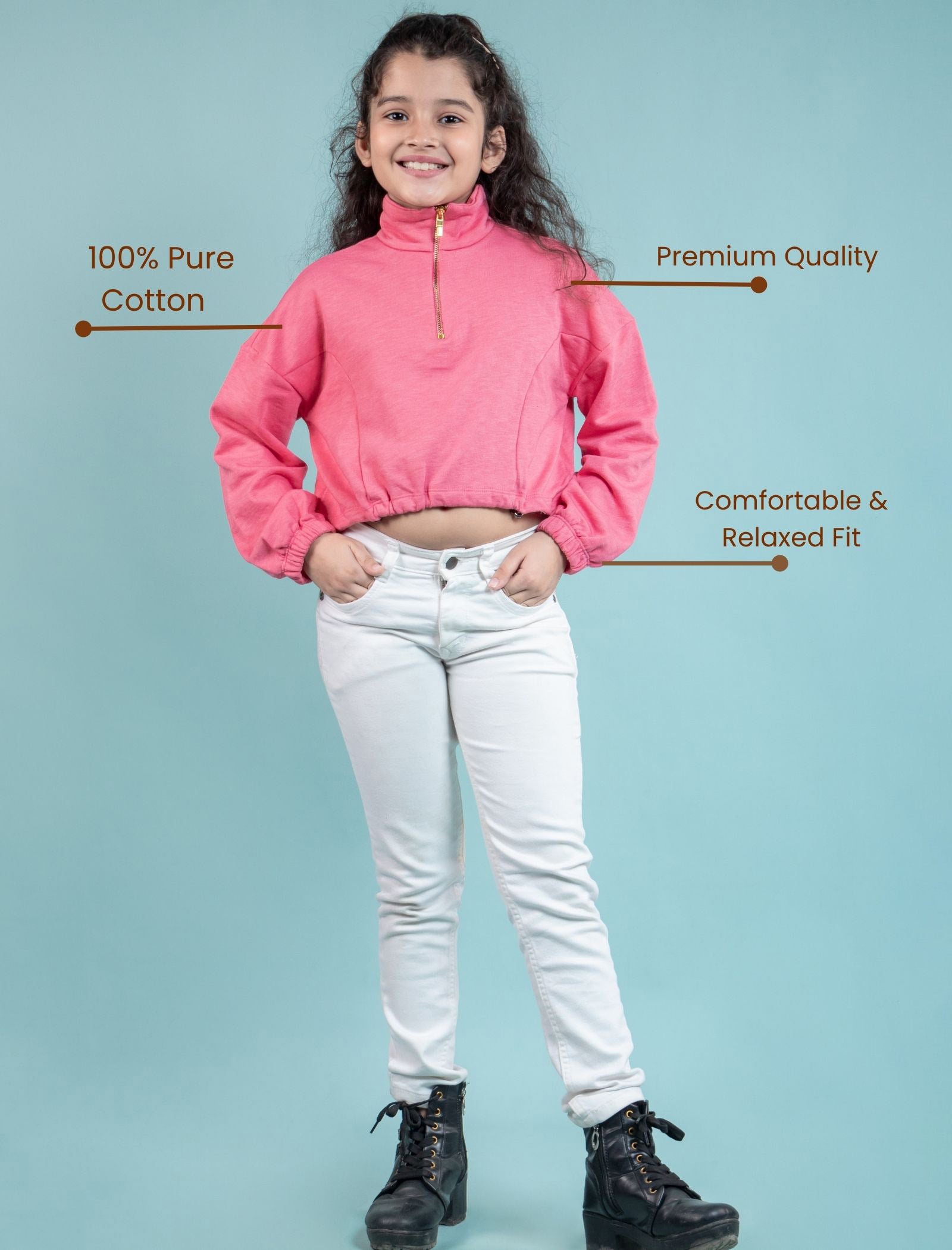 Zippered sweatshirt for kids wearing a pink jacket and white pants with text on a light blue background